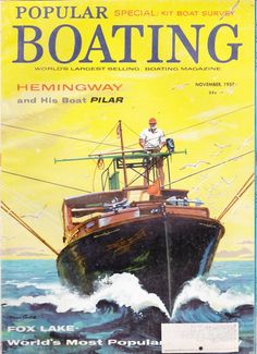 the cover of popular boating magazine showing a man on top of a ship in rough water