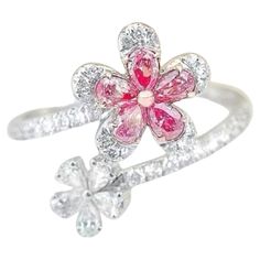 18K White Gold Pear-Cut Fancy Pink Diamond & Diamond Flower Ring 5 Fancy Pink Diamonds - 0.26 CT Diamonds - 0.36 CT Total Weight - 2.92 GM Diamond Flower Ring, Pink Diamonds, Diamond Flower, Pink Diamond, Flower Ring, Pear Cut, Cut Flowers, Diamond White, Fashion Rings