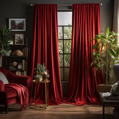 a living room with red drapes and plants on the windowsills, in front of a large window