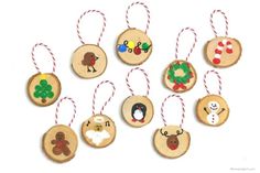 christmas ornaments made out of wooden slices with different types of decorations hanging from the strings