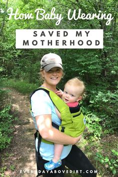 a woman holding a baby in her arms with the words how baby wearing saved my motherhood