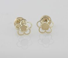 "Beautiful and Delicate pair 14k Flower Stud Earrings with Laser Cut and Screw Back It's perfect for anyone any age for any occasion, a great gift for that special someone or yourself. Item Specifications: Model # BE-6876 Metal Type: 14K Gold \"Solid\" Metal Stamp: 14K Style: Stud Earring Fastening: Screw Backs Shape: Laser Cut Flower Stud Flower Size: 5/16 inch (approx 8mm) Finish: Laser Cut Earrings Puff Pad size: 1 3/8 inches x 1 1/8inch (35mm x 28mm) The screw backs are really good for kids 14k Gold Flower Shape Pierced Earrings, 14k White Gold Flower Earrings, Yellow Gold Flower Earrings, 14k Gold Flower Earrings For Pierced Ears, Hypoallergenic Yellow Gold Flower-shaped Earrings, 14k Gold Hypoallergenic Flower-shaped Earrings, Hypoallergenic 14k Gold Flower Shaped Earrings, Laser Cut Flower, Tiny Gold Earrings