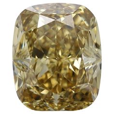 a fancy yellow diamond is shown in this close up shot, with the center square cut and