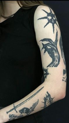 a woman with a tattoo on her arm