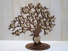 a wooden tree with hearts on it