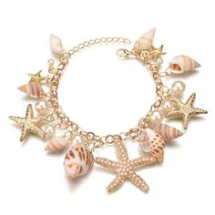 Introducing our charming Multi Starfish Sea Star Conch Shell Simulated-Pearl Beach Bracelet, a perfect accessory for capturing the spirit of the ocean and adding a touch of beachy elegance to your ensemble. This bracelet features a delightful mix of starfish, sea stars, conch shells, and simulated pearls, all intricately combined to create a stunning piece that evokes the beauty of the sea. The real shells add an authentic, natural touch, while the alloy elements provide durability and a polishe Ocean Bracelet, Seashell Bracelet, Pearl Charm Bracelet, Stella Marina, Starfish Bracelet, Beach Bracelets, Starfish Necklace, Amber Ring, Shell Bracelet