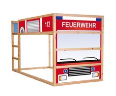 a wooden bunk bed with a fire truck on the top and bottom part painted red