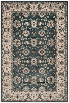 a green rug with an ornate design on the bottom and beige trimming around it