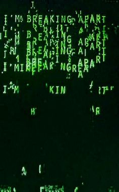 the words are written in green and white on a black background that appears to be lit up