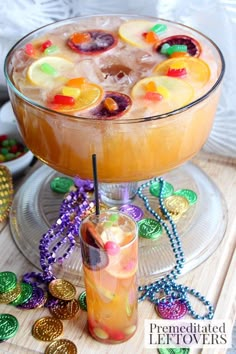 a drink in a glass with candy on the rim