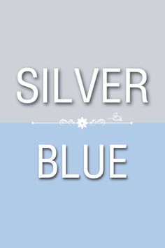 the word silver blue is cut out from white paper and placed on top of a light blue background