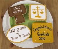 a plate with cookies on it that are decorated like law offices