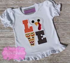 This adorable turkey love design is perfect for your little one to wear this Thanksgiving. All of my items are made to order, choose your shirt type, size and applique fabric and I will make a custom shirt just for you! Boys Thanksgiving Shirts, Girls Ruffle Shorts, Face Applique, Thanksgiving Baby Outfits, Turkey Face, Girls Tank Top, Fall Baby Clothes, Blessed Shirt, Girls Thanksgiving