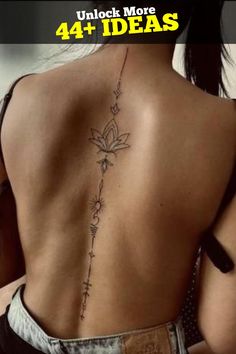 the back of a woman's body with tattoos on it