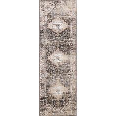 a large rug with an ornate design on the bottom and sides, in grey tones