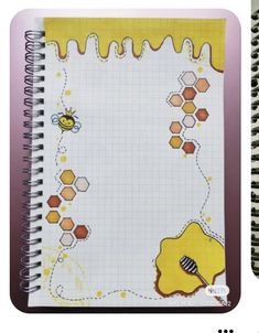 two notebooks, one with bees and the other with honeycombs on it