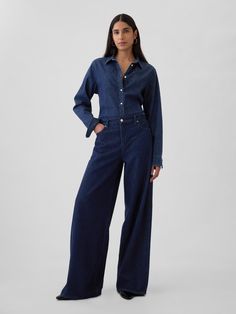 Fit: A full-length, supersoft baggy jean that's fitted on the waist & relaxed all the way down.  ​ Fabric: 55% Cotton, 40% Tencel, 5% Recycled Cotton.  Stretch:  No Stretch Jeans.  Authentic denim that gets better with every wear.  Made to wear all day & break in over time.  ​ Rise :   Mid Rise Jeans.  Look: A five-pocket baggy jean in a dark indigo wash.  ​ Details:  Zip fly & five-pocket styling.  Responsibly Made:  This pair of denim is made with 5% recycled cotton and is part of our water-sa The Gap Jeans, Dark Flared Jeans, Dark Wash Jeans Outfit, Dark Washed Jeans Outfit, Vintage Street Wear, Wash Jeans Outfit, 2024 Wardrobe, Brown Denim, Baggy Jean