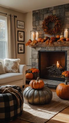 a living room filled with furniture and a fire place covered in pumpkins next to a window