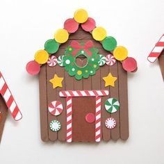 gingerbread house made out of construction paper and candy canes