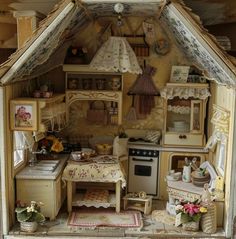 a doll house with furniture and accessories in the inside, as well as flowers on the outside