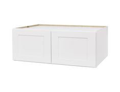 a white cabinet with two doors and one drawer