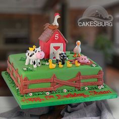 a cake with farm animals on it