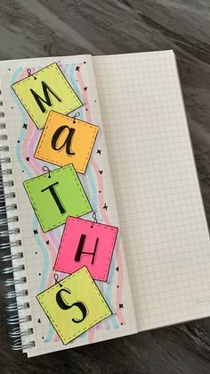 an open notebook with the words math on it