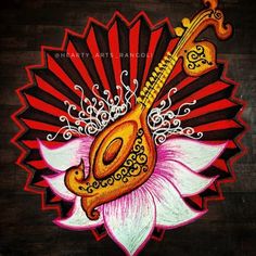 a drawing of a guitar on top of a flower with an ornate design around it