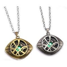 two necklaces with green stones on them, one is gold and the other is silver