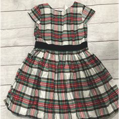 This Is The Perfect Dress For The Holiday Season! It Is Plaid And Buttons In The Back. The Brand Is Carters In A Size 7. Multicolor Christmas Dress For Dress-up, Multicolor Christmas Dress-up Dresses, Multicolor Christmas Dress, Cute Cotton Holiday Dresses, Playful Fitted Holiday Dress, Playful Fitted Dress For Holiday, Multicolor Cotton Holiday Dress, Casual Plaid Holiday Dress, Holiday Multicolor Cotton Dress