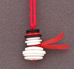 an ornament hanging from a red string