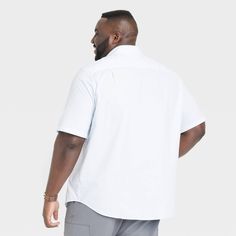 Refresh your smart-casual wardrobe with this Short-Sleeve Button-Down Shirt from Goodfellow & Co™. The short-sleeve shirt is made from cotton-blend fabric with added spandex for comfortable wear that moves with you. It features a collared neckline with a button-front design and a chest patch pocket for classic style. Showcasing a sleek striped pattern, you can pair it with anything from chinos to jeans for a variety of looks that you're sure to love sporting. Goodfellow & Co™: Where style & fit Casual Short Sleeve Relaxed Fit Dress Shirt, Casual Relaxed Fit Short Sleeve Dress Shirt, Smart Casual Wardrobe, Slim Fit Shorts, Fabric Names, Button Down Collar, Big And Tall, Slim Fit Men, Mens Big And Tall