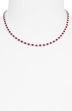 Alternating brilliant diamonds and radiant rubies bring exquisite sparkle to this hand-polished necklace crafted from 14-karat white gold. 16" length; 1/8" width Total ruby weight: 8.20ct. Total diamond weight: 1.13ct. Color: H Clarity: SI1 14k gold/ruby/diamond Imported >Diamond Guide Fine Jewelry Ruby Diamond Necklace Brilliant Cut, White Gold Ruby Necklaces With Brilliant Cut, White Gold Ruby Necklace With Diamond Cut, White Gold Ruby Necklace With Brilliant Cut, Formal Silver Gemstone Tennis Necklace, Anniversary Gemstone Tennis Necklace, Anniversary Round Gemstone Tennis Necklace, Fine Jewelry Red Diamond Necklace With Brilliant Cut, Silver Diamond Tennis Necklace With Gemstones