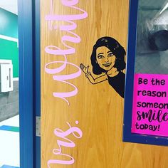 a door with the words smile today on it and an image of a woman's face