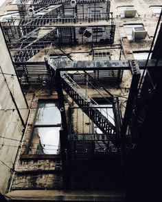 an old fire escape on the side of a building