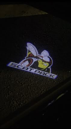 a close up of a sticker on the ground