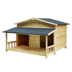 a wooden dog house with a blue roof