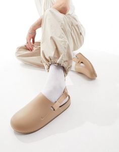 Sneakers by Nike These shoes + you = solemates Slingback strap Slip-on style Round toe Chunky sole Casual Beige Clogs With Textured Footbed, Casual Beige Clogs With Cushioned Footbed, Nike Mules Outfit, Casual Beige Clogs With Cork-bed Midsoles, Casual Beige Clogs With Rubber Sole, Casual Beige Slip-on Mules, Casual Beige Mules With Rubber Sole, Casual Slingback Mules With Rubber Sole, Beige Casual Mules With Cushioned Footbed