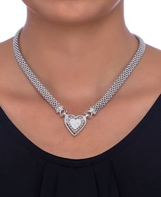 A romantic accent. This chic, heart charm necklace is outlined by sparkling round-cut diamonds (1/4 ct. t.w.) with a trendy mesh chain. Set in sterling silver. Approximate length: 18 inches. Approximate drop: 1 inch. Luxury Silver Heart Cut Diamond Necklace, Luxury Silver Diamond Heart Pendant Necklace, Luxury Silver Heart Pendant Diamond Necklace, Silver Heart Pendant Luxury Diamond Necklace, Silver Heart-shaped Diamond Necklace With Pave Setting, Luxury Silver Heart Necklace For Formal Occasions, Formal Luxury Silver Heart Necklace, Macy's Luxury Silver Jewelry, Luxury Heart Shaped Jewelry With Pave Setting