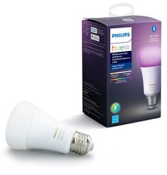 the philips hue smart light bulb is in its box and next to it's packaging