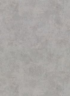 a gray concrete wall textured with light grey paint