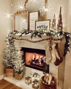 a fireplace decorated for christmas with stockings, stockings and garlands on the mantel