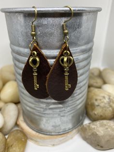 "Handmade, small teardrop leather earrings with a variety of dangle bronze key charms and coordinating hooks. Measures Aprox 1.5\". Vintage key charms. Plum purple, black, camel yellow or weathered cognac brown." Brown Teardrop Brass Earrings, Large Necklace, Glitter Earrings, Fall Earrings, Vintage Keys, Plum Purple, Custom Earrings, Black Earrings, Blue Earrings