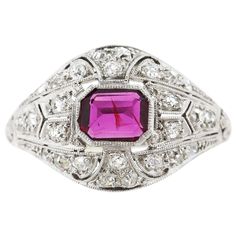 An antique Art Deco platinum diamond and rectangular shape ruby ring. The ruby is set in a beautiful original filigree platinum mounting set with numerous old single cut diamonds. Delicate scrolls and leaf pierce work adorn the mounting. The ruby is a deep red, not pink color. There is a natural inclusion in the ruby that is evident in the light box, but when it is on the finger it is not noticeable. The ring is a size 5. Rubin Ring, Marquise Shape Diamond, Demantoid Garnet, Platinum Diamond Rings, 1920s Art Deco, Art Deco Period, Art Deco Diamond, Domed Ring, Pretty Rings