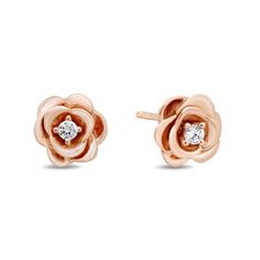 Such a classic pair of earrings but now given a magical twist. These rose-shaped studs with diamond center are crafted from 14k rose gold over sterling silver. They are part of the Enchanted Disney Fine Jewelry Collection and are inspired by Belle. With a design influenced by Belle's character, you'll see these rose earrings to be gentle and delicate yet very much capable of standing and shining on their own. Disney Princess Earrings, Unique Diamond Earrings, Enchanted Disney, Enchanted Disney Fine Jewelry, Disney Belle, Disney Fine Jewelry, Diamond Earrings For Women, Rose Diamond, Princess Earrings