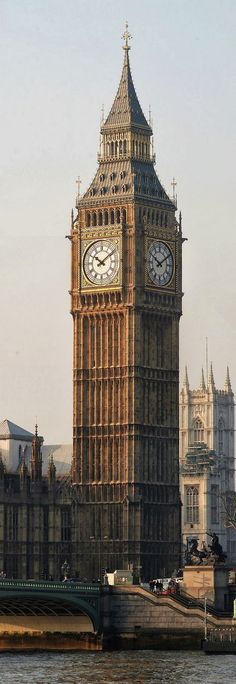 the big ben clock tower towering over the city of london