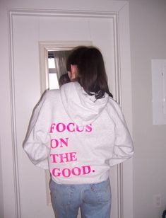 Introducing our Focus on the Good Hoodie! With a relaxed fit and cozy hood, it's perfect for lounging at home, spreading positivity on the go, or a sunset at the beach! Elevate your style and spread positivity with our new handmade hoodie ☻ ✿ True colors are shown in the last photo ✿ All sizes are unisex. If you have any questions please let me know! Please read/view shop policies and full listing before purchasing. Thank you so much! ✿ CARE For washing, turn inside out and wash with cold water. Hang your item to dry. When ironing, turn item inside out and iron. Do not iron on the design unless it is inside out. Tags: Cute hoodie, aesthetic, trendy, saying on back, gift for her, words on back, crewneck, womens sweatshirt, college, sorority, be kind, pinterest Fall Text Print Hooded Hoodie, Hooded Text Print Hoodie For Fall, Fall Hooded Hoodie With Text Print, Hooded Text Print Sweatshirt For Fall, Trendy Crew Neck Sweatshirt With Drawstring Hood, Relaxed Fit Slogan Hoodie For Loungewear, Hooded Sweatshirt With Letter Print Relaxed Fit, Relaxed Fit Graphic Print Hoodie Sweats, Relaxed Fit Hooded Sweatshirt With Letter Print