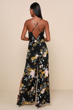 Your style will be the talk of the town when you wear the Lulus Beautiful Blooms Black Floral Print Wide-Leg Jumpsuit! Silky woven black fabric, decorated in gorgeous floral print, shapes a princess-cut bodice with adjustable crisscross straps and V-neckline. Open back and fitted waist top wide-leg pants with thigh-high slits. Hidden back zipper/clasp. Fit: This garment fits true to size. Length: Floor length. Size medium measures 54" from adjustable straps to hem. Inseam: 30.50 Front Rise: 14.0 Spring Floral Print Jumpsuits And Rompers For Date Night, Black Printed Jumpsuits And Rompers For Party, Elegant Floral Print Jumpsuits And Rompers For Vacation, Floral Print Jumpsuits And Rompers For Date Night, Elegant Floral Print Jumpsuits And Rompers For Night Out, Spring Night Out Printed Jumpsuits And Rompers, Chic Floral Print Jumpsuits And Rompers For Spring, Elegant Floral Jumpsuits And Rompers For Spring, Summer Floral Print Jumpsuits And Rompers For Date Night