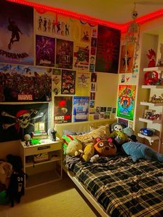 a bed room with a neatly made bed and lots of posters on the wall