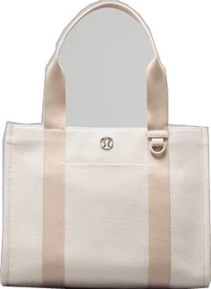 Lululemon Casual Rectangular Bag, Casual Rectangular Lululemon Bag, Lululemon Rectangular On-the-go Bag, Versatile Lululemon Bag With Functional Pockets, Versatile Daily Lululemon Bags, Lululemon Bags With Pockets For Everyday Use, Lululemon Bag With Removable Pouch For Everyday Use, Versatile Lululemon Bags For Everyday, Functional Rectangular Lululemon Bag